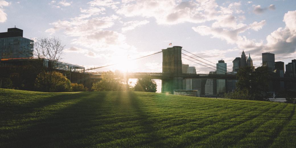 Photo by Kevin Rajaram on Unsplash Photo of a park in Dumbo, Brooklyn